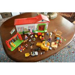 Playmobil Huis plus speeltuin met heel veel poppetjes