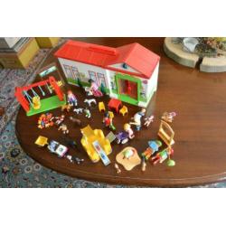 Playmobil Huis plus speeltuin met heel veel poppetjes