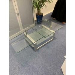 Design salontafel glas met rvs draaibaar Max 150cm