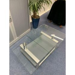 Design salontafel glas met rvs draaibaar Max 150cm